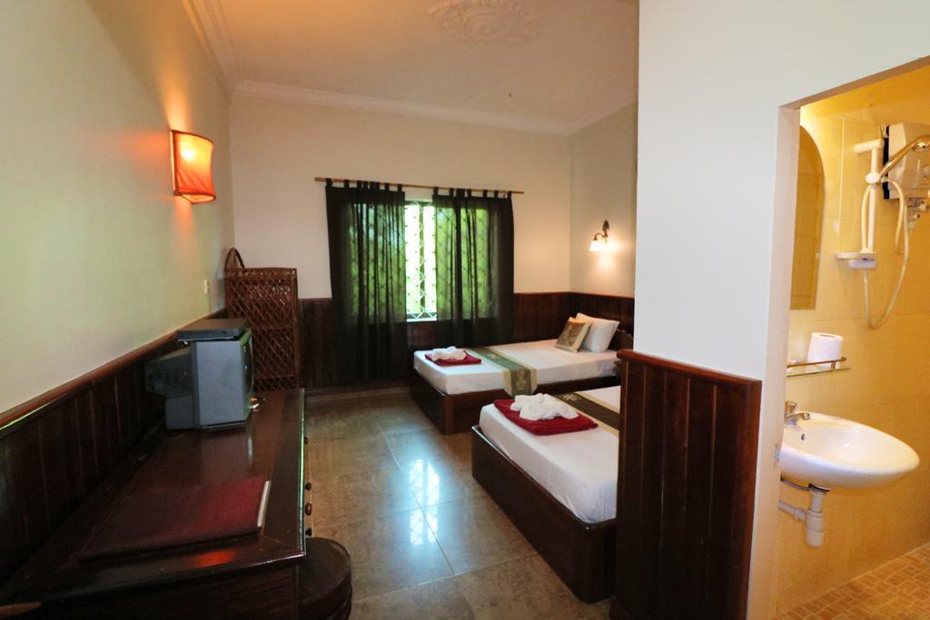 Firefly Guesthouse - The Berlin Angkor Ciudad de Siem Riep Habitación foto